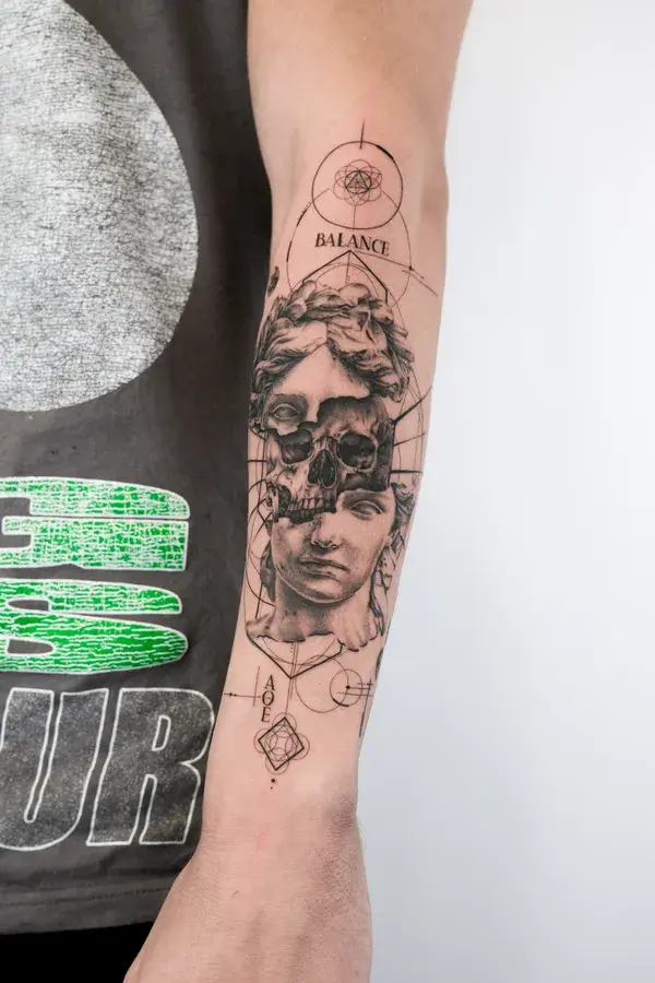 Statue Skull Balance Tattoo